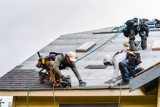Professional Emergency Roof Repair technician working in Baldwin Place, NY